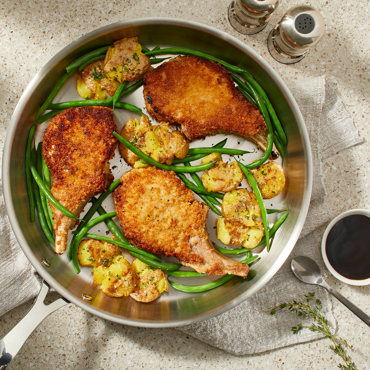 Balsamic Glazed Breaded Pork Chops with Green Beans and Pressed Potato – Paderno